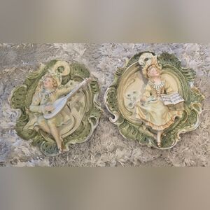Pair If Ornate Porcelain Figurines Wall Hangings